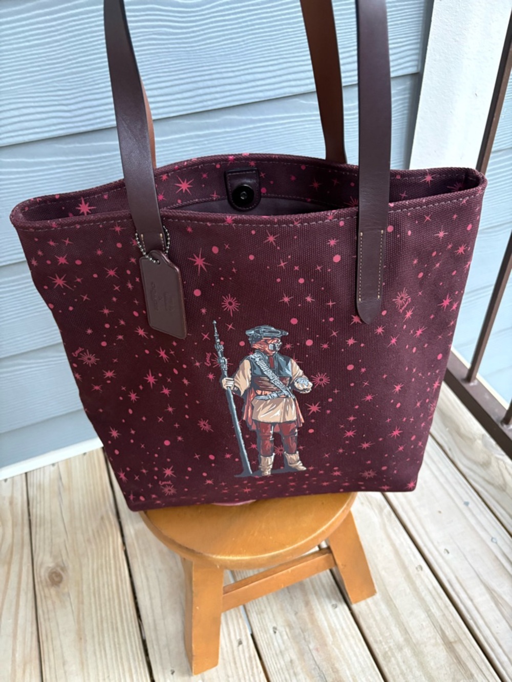 Star Wars X Coach Tote
With Starry Print And Princess Leia As Boushh